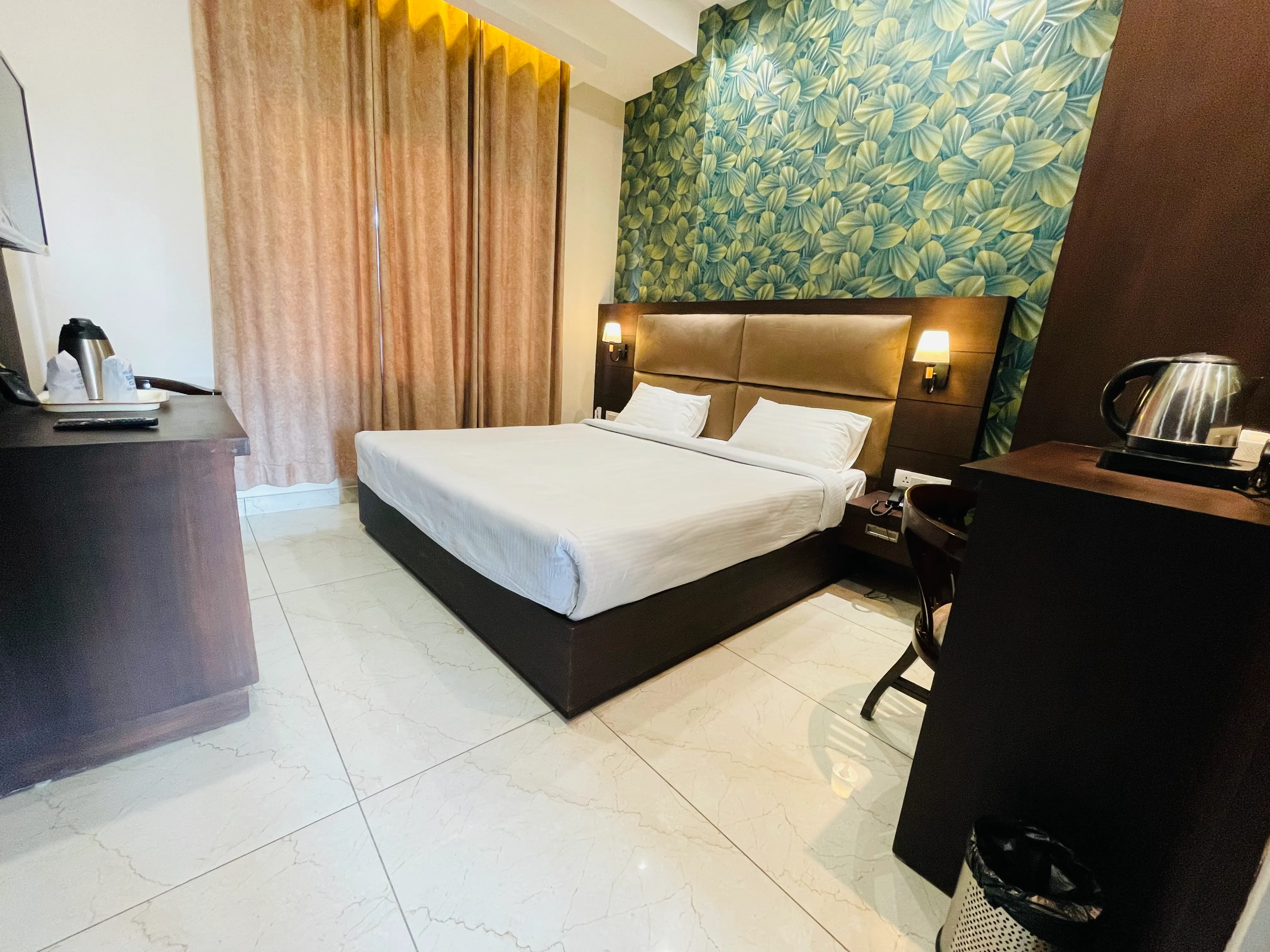 Bedroom with Leaf Wallpaper