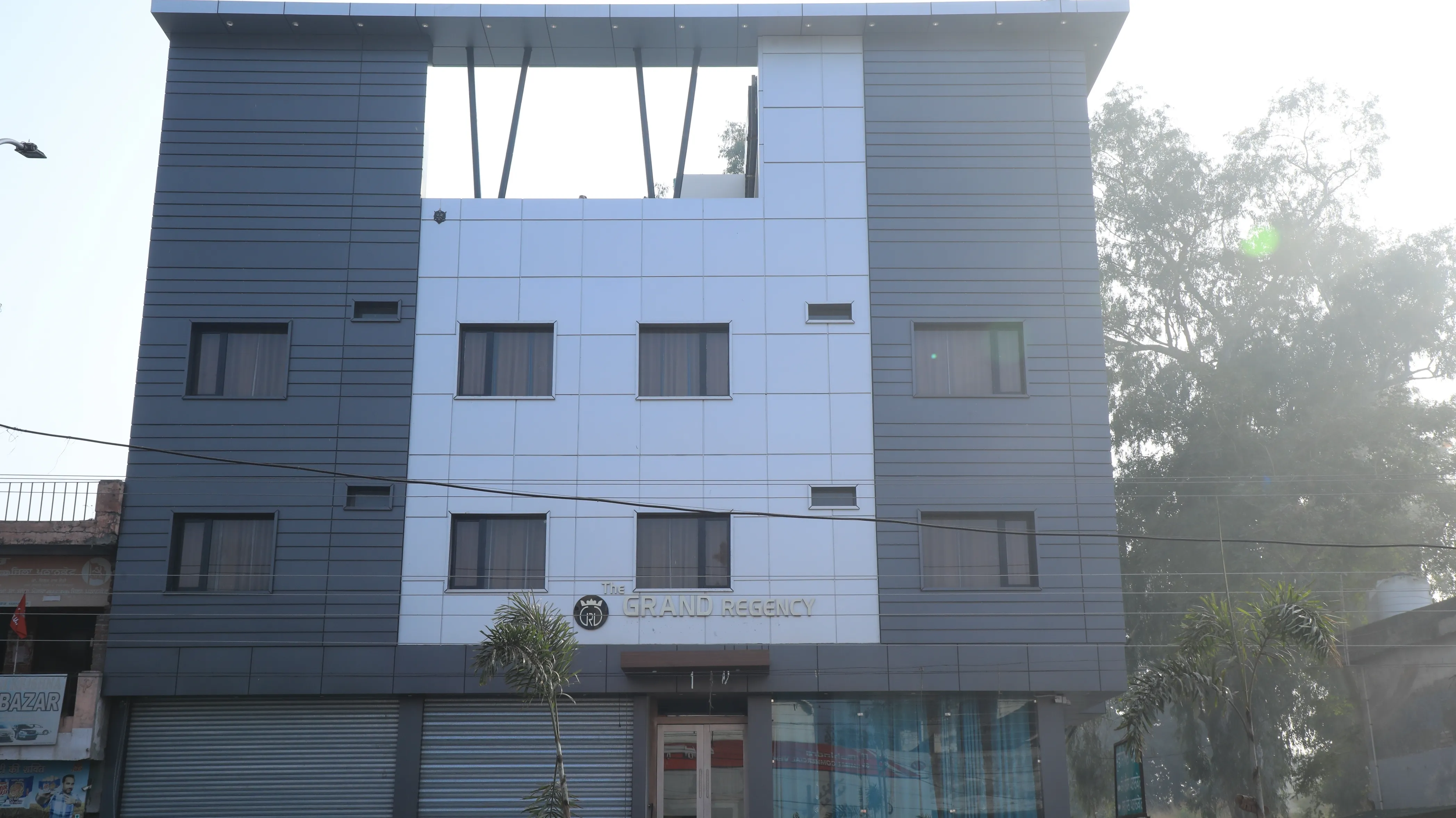 Daytime front view of The Grand Regency on Dalhousie Road, Pathankot